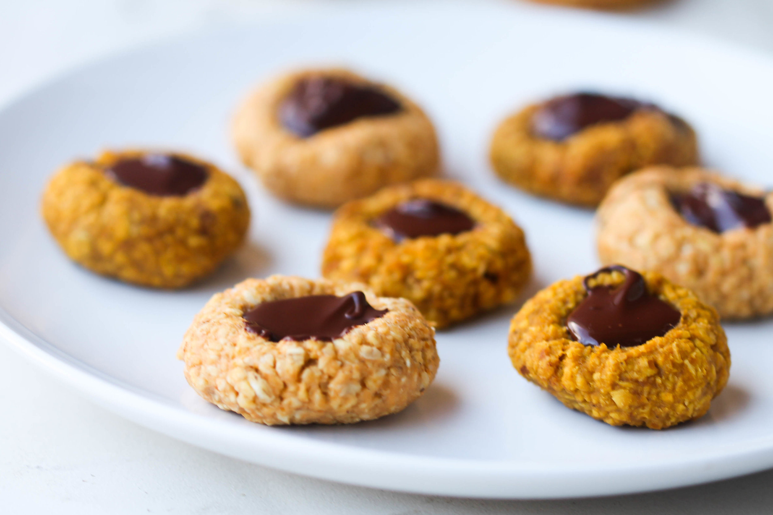 Oat and Pumpkin Thumbprint Cookies - Made in one bowl, great for snacking for both kids and adults. Naturally gluten-free, nut-free and can be made vegan friendly or raw.