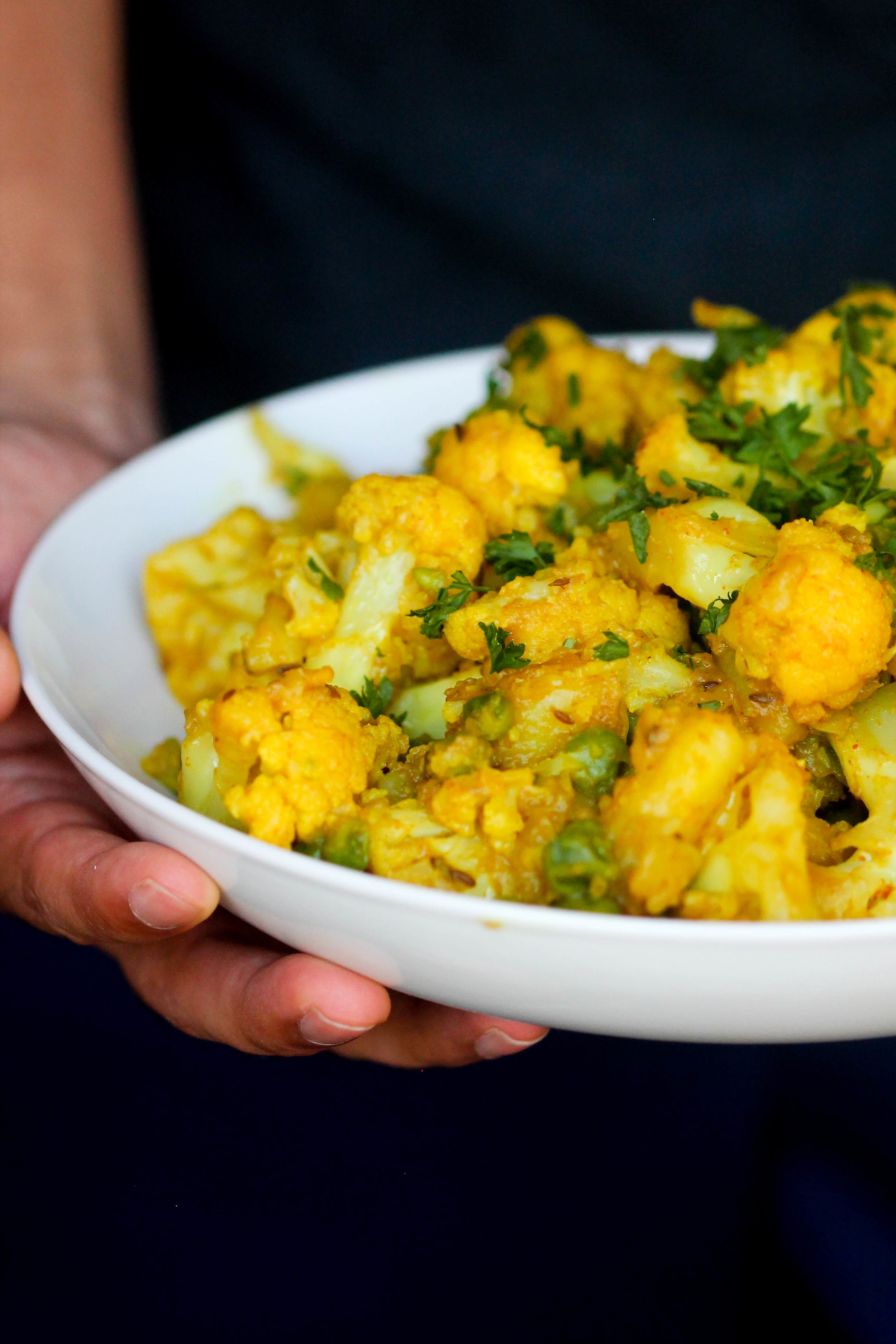 Cauli Aloo is a one pot vegetarian/vegan/gluten-free side dish that can be made under 30 minutes.