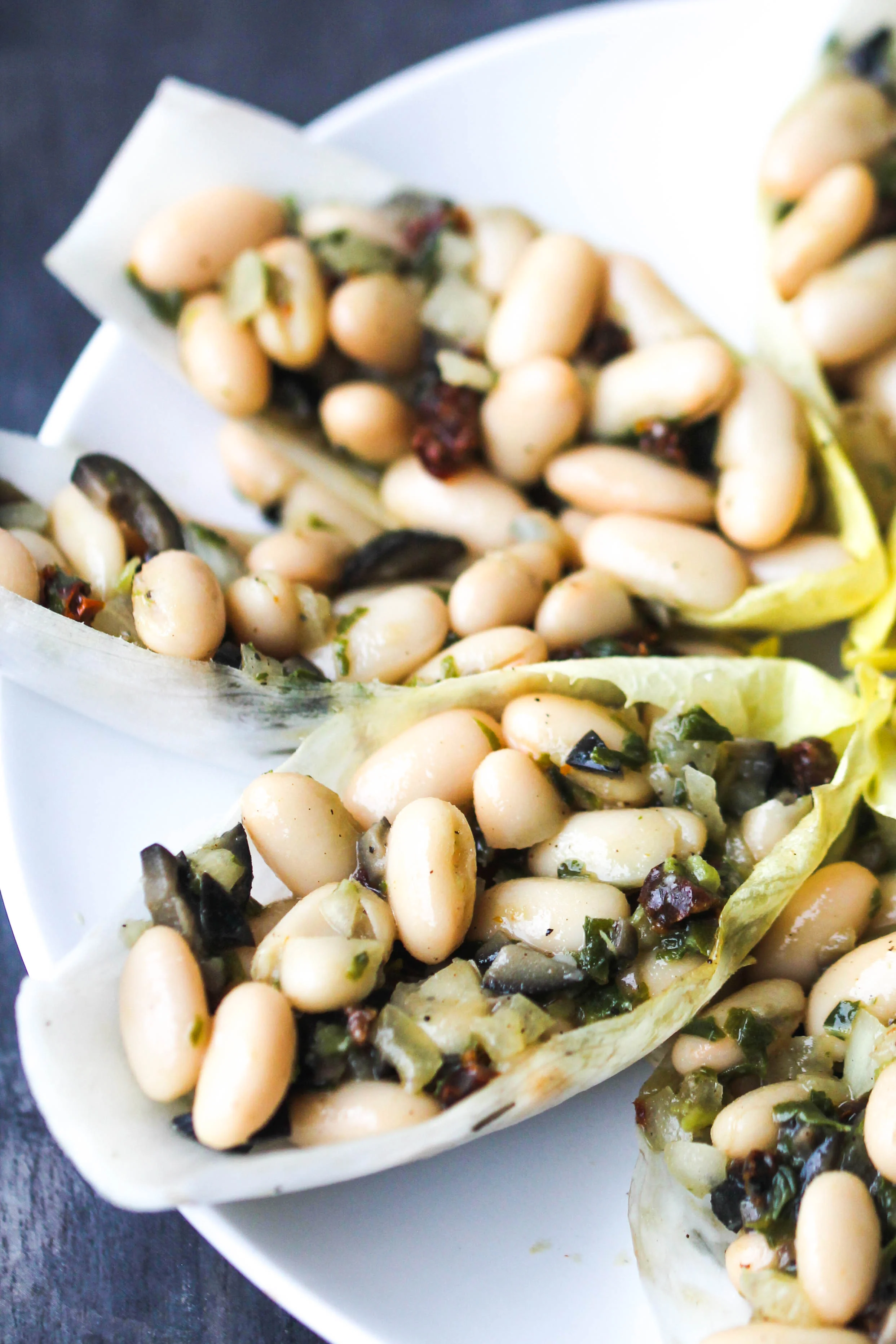 Cannellini Bean Salad with Basil and Sun-Dried Tomatoes makes a lovely light lunch or can be enjoyed as a refreshing side, or take it to a picnic, potluck. It is naturally vegan & gluten-free.