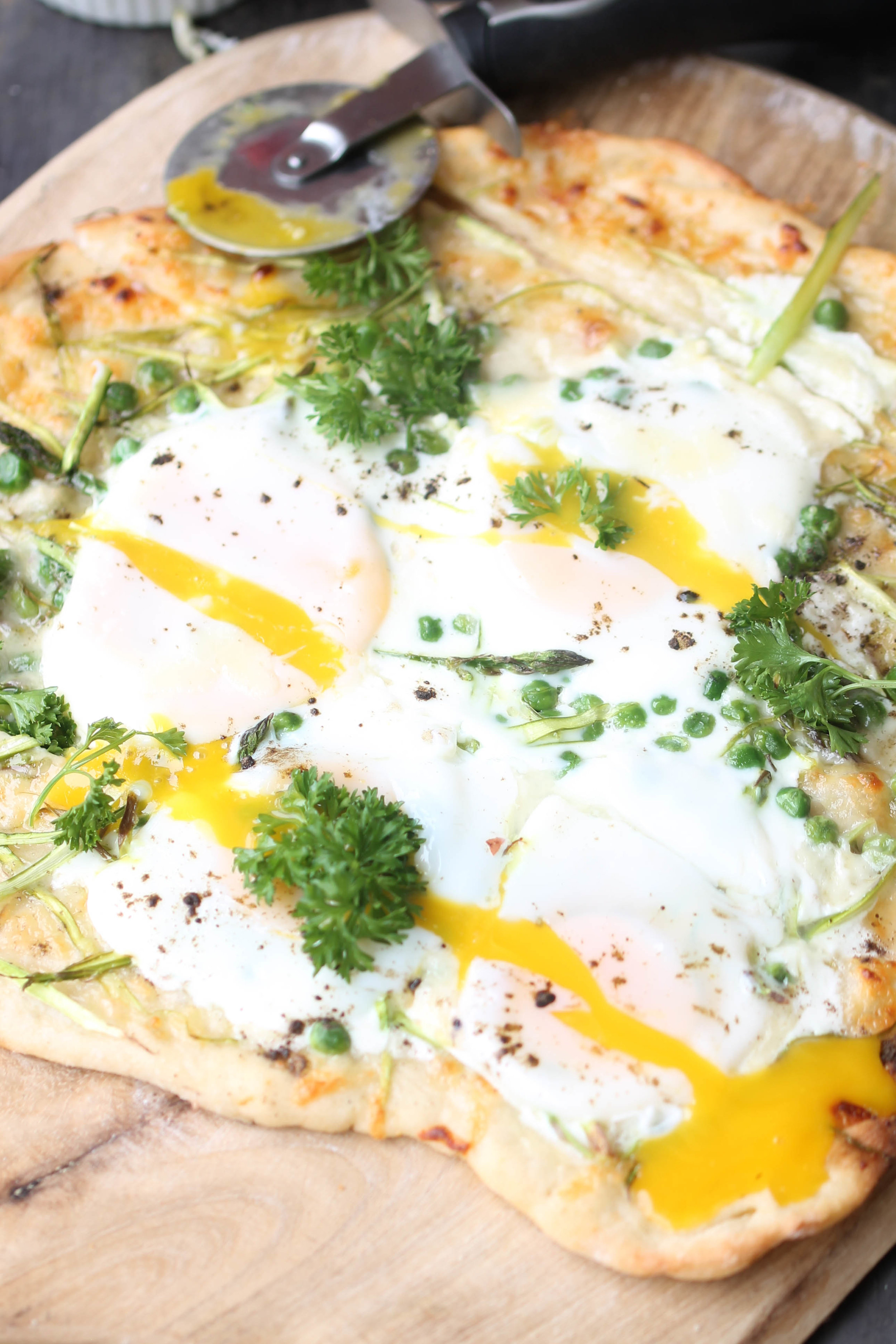 Switch up your brunch game with Spring Brunch Pizza! Simple ingredients, flexible, and enjoyed by everyone.