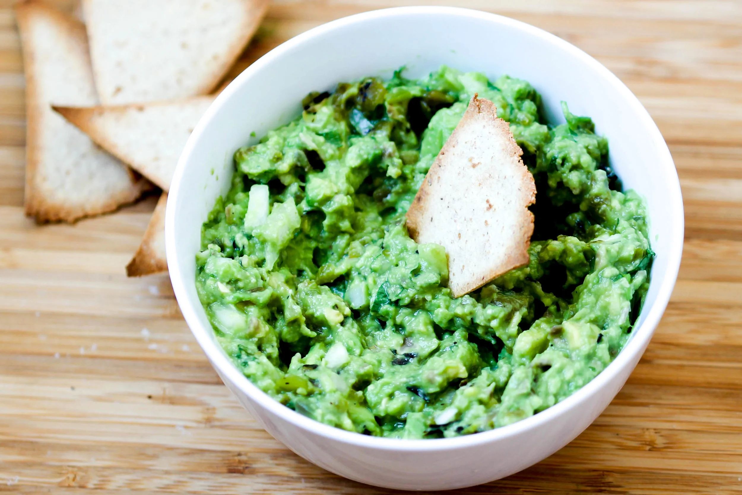 Add some heat and smokiness to your regular guacamole & whip up a batch of Hatch Chile Guacamole while hatch chile is in season.