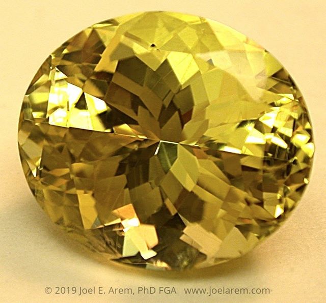 Yellow Sapphire from Sri Lanka, untreated, re-cut from 20.45 to 14.29 carats. This amazingly brilliant and eye-clean gem represents about as high a level of saturation in a pure yellow color as you will find - the photo is actually even a bit less sa