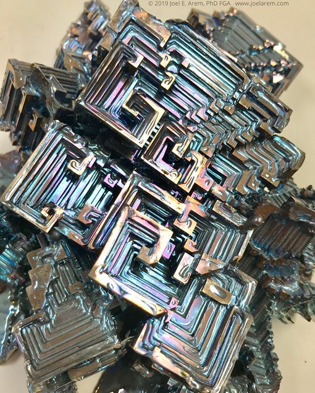 Bismuth crystals, grown from a melt more than a decade ago. This photo shows a small portion of what may be one of the largest examples of crystallized bismuth in existence, measuring 22x15 cm and weighing about 1.7 kilograms. Bismuth, element #83 in