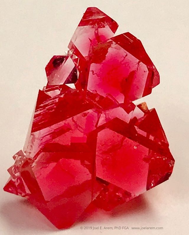 Synthetic flux-grown spinel, magnesium aluminum oxide + chromium, 25 mm tall, grown for research purposes in the early 1970s. Many of the gemstones in use today have synthetic counterparts. Some of them (such as ruby) were first produced more than a 