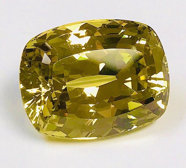 Chrysoberyl, a true museum piece. This Brazilian gem is flawless and weighs 52.10 carats. It was produced in the late 1970s, a time when the true rarity and potential value of gems like this were not well appreciated, especially compared to the other