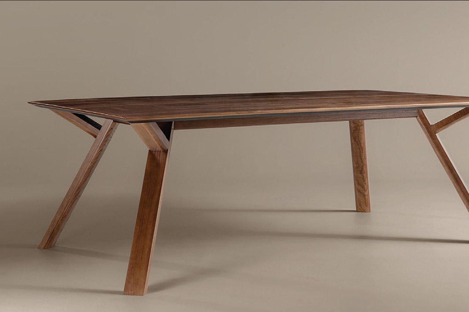 Stylized product image of Gunlocke Saranac table on a clean neutral background