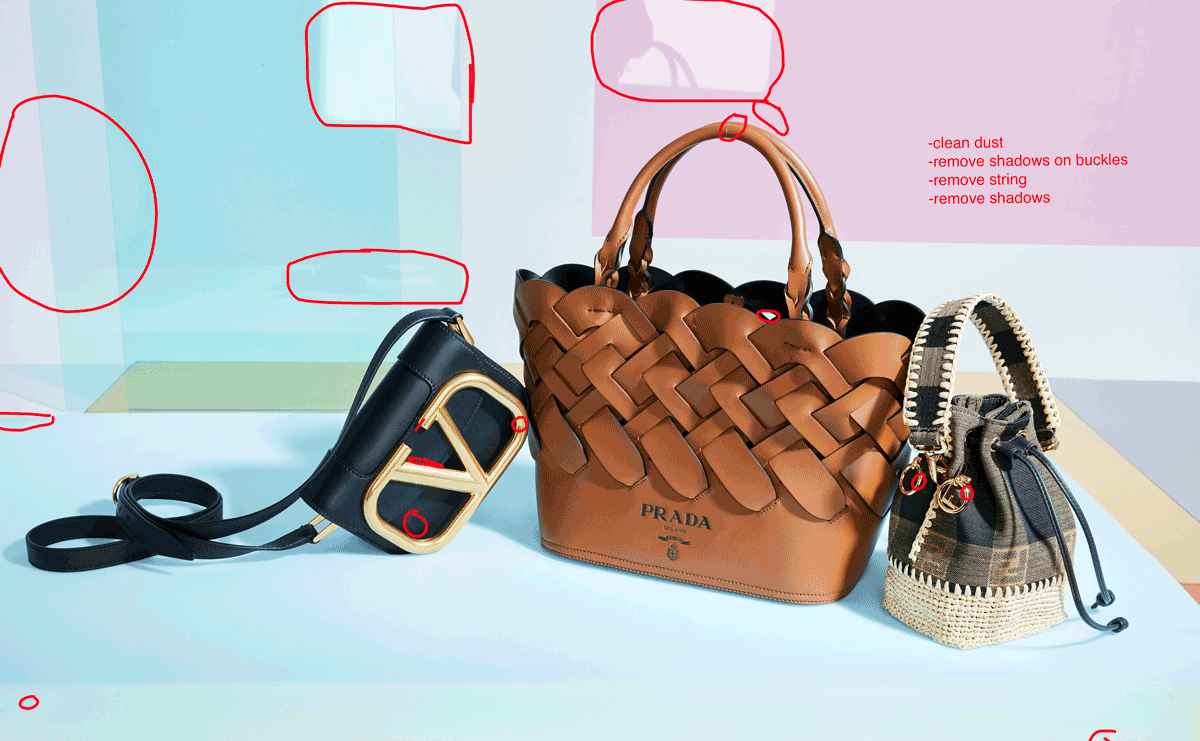 Multiple designer handbags, including a Prada woven leather bag, a black bag with a gold logo, and a small woven bag with a strap, arranged on a surface with instructions and colored markings on the background.