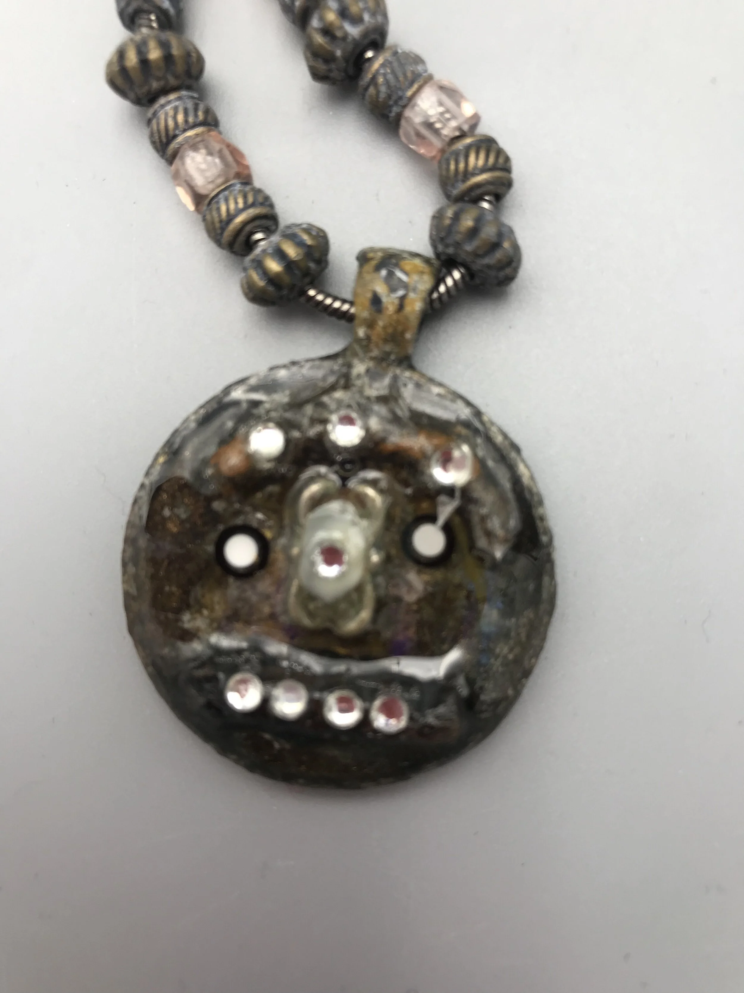 Check my Crystal Grill Face pendant necklace