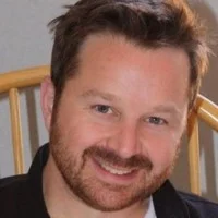 Darren Stowell Headshot Photo.jpeg