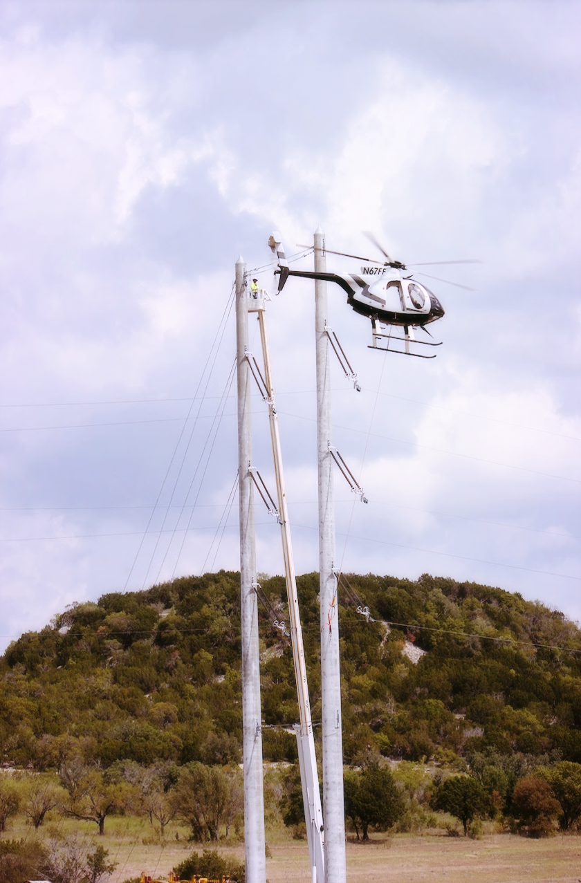 Helicopter work on the Lonestar 345kV Project