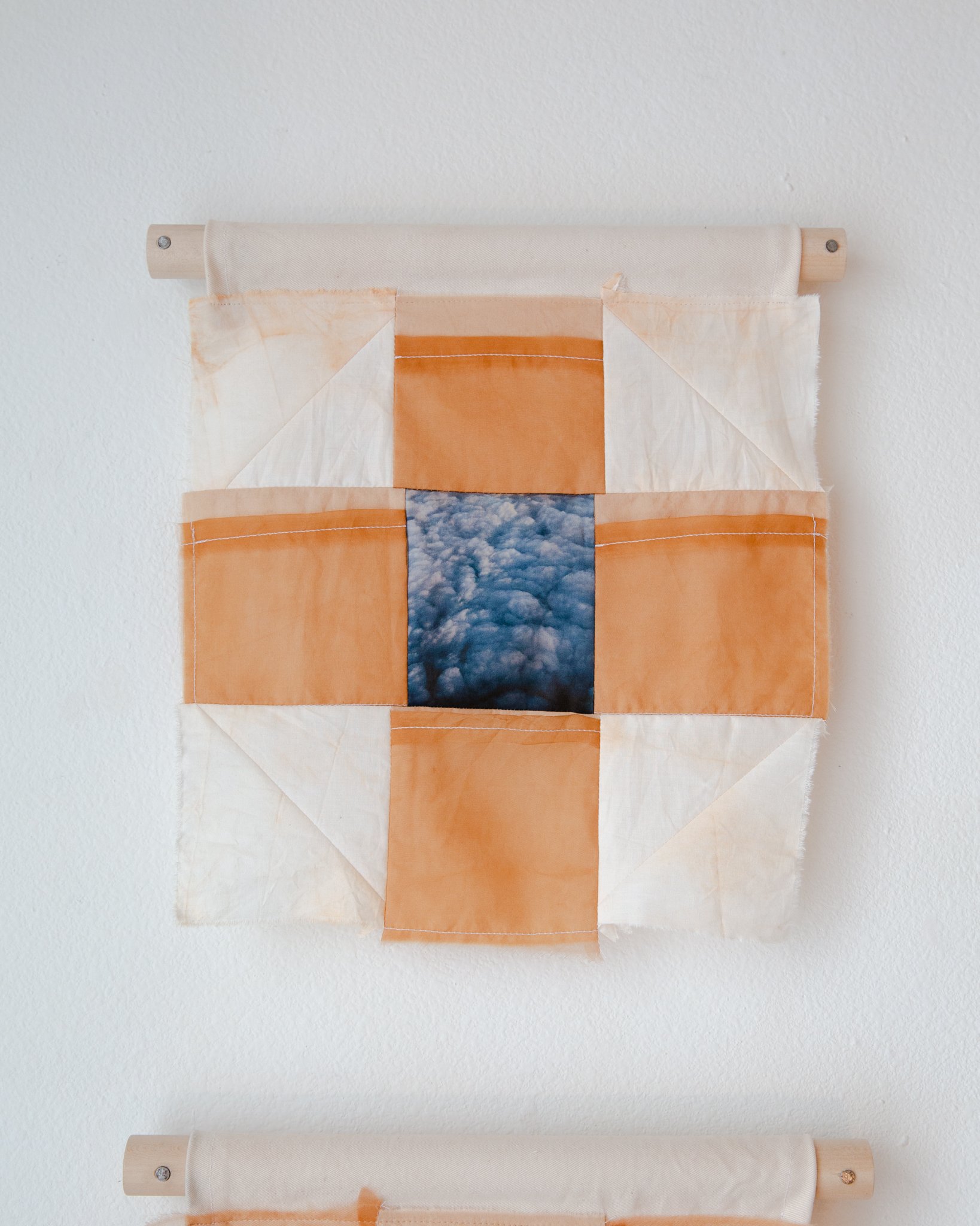   transforming continuance , 2023  recycled cotton bed sheets, silk organza dyed with locally foraged loquat leaves, and California clay, photo printed on silk charmeuse 