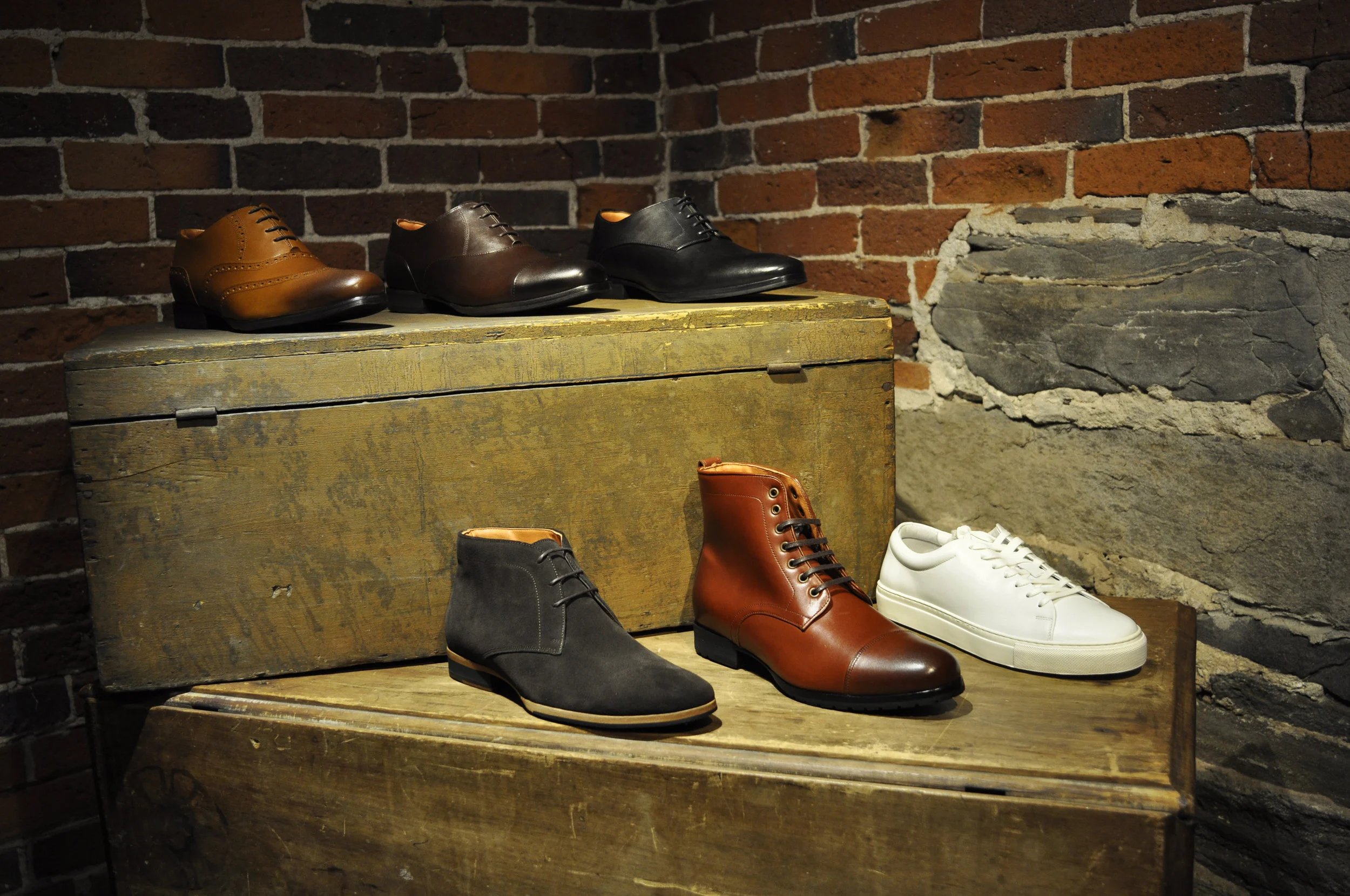 From Top Left clockwise: The Senna Wingtip ; The Closer Captoe ; The Barrister Derby ; The Glider Cupsole Sneaker ; The Breakaway Ankle Boot ; The Striker Chukka