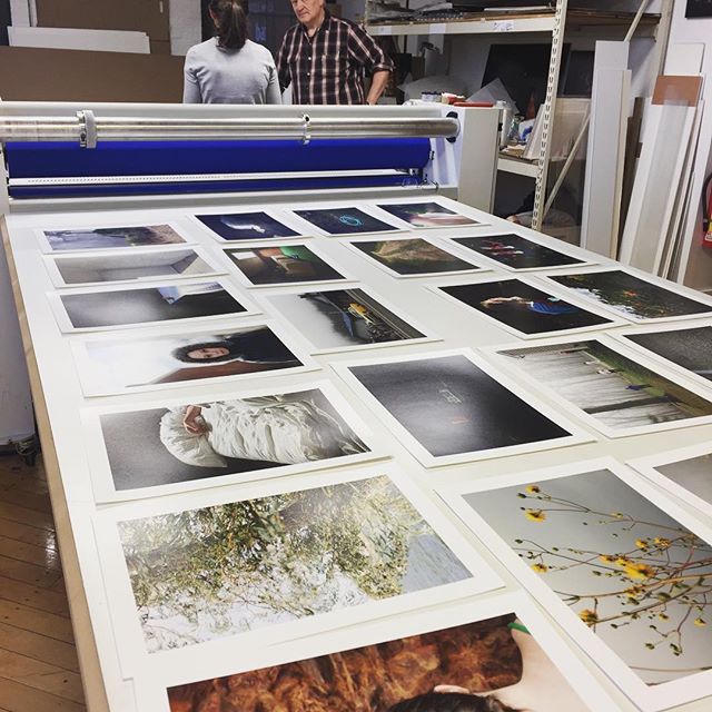 Later-gram of Nicole Enerson and @marcandrewelliott looking over Nicole&rsquo;s work here at Acorn HQ