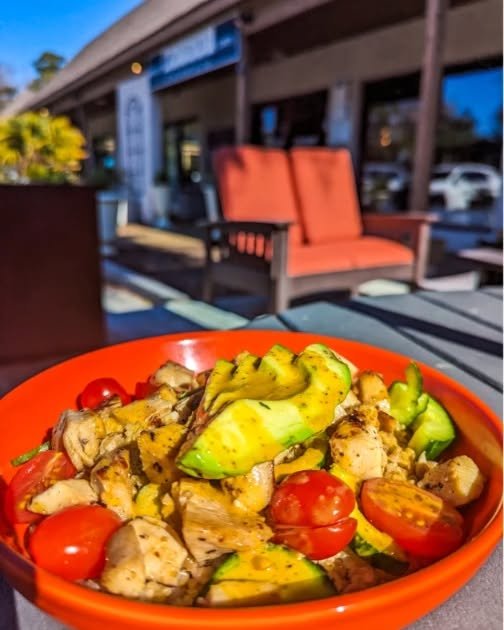 Bask in the outdoor sunshine and vitamin D while nourishing your body with our Powerhouse Bowl! Quinoa, farro, cucumber, tomato, avocado, and Springer Mountain chicken, all drizzled with a zesty cilantro vinaigrette.

Healthy and happy vibes in every