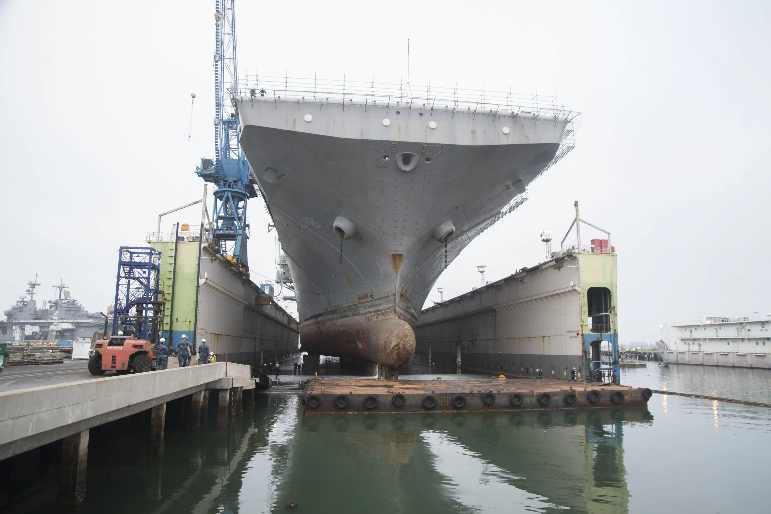 USS Makin Island (LHD-8) entered a floating dry dock at National Steel and Shipbuilding Company (NASSCO), Aug. 25, 2017. US Navy Photo