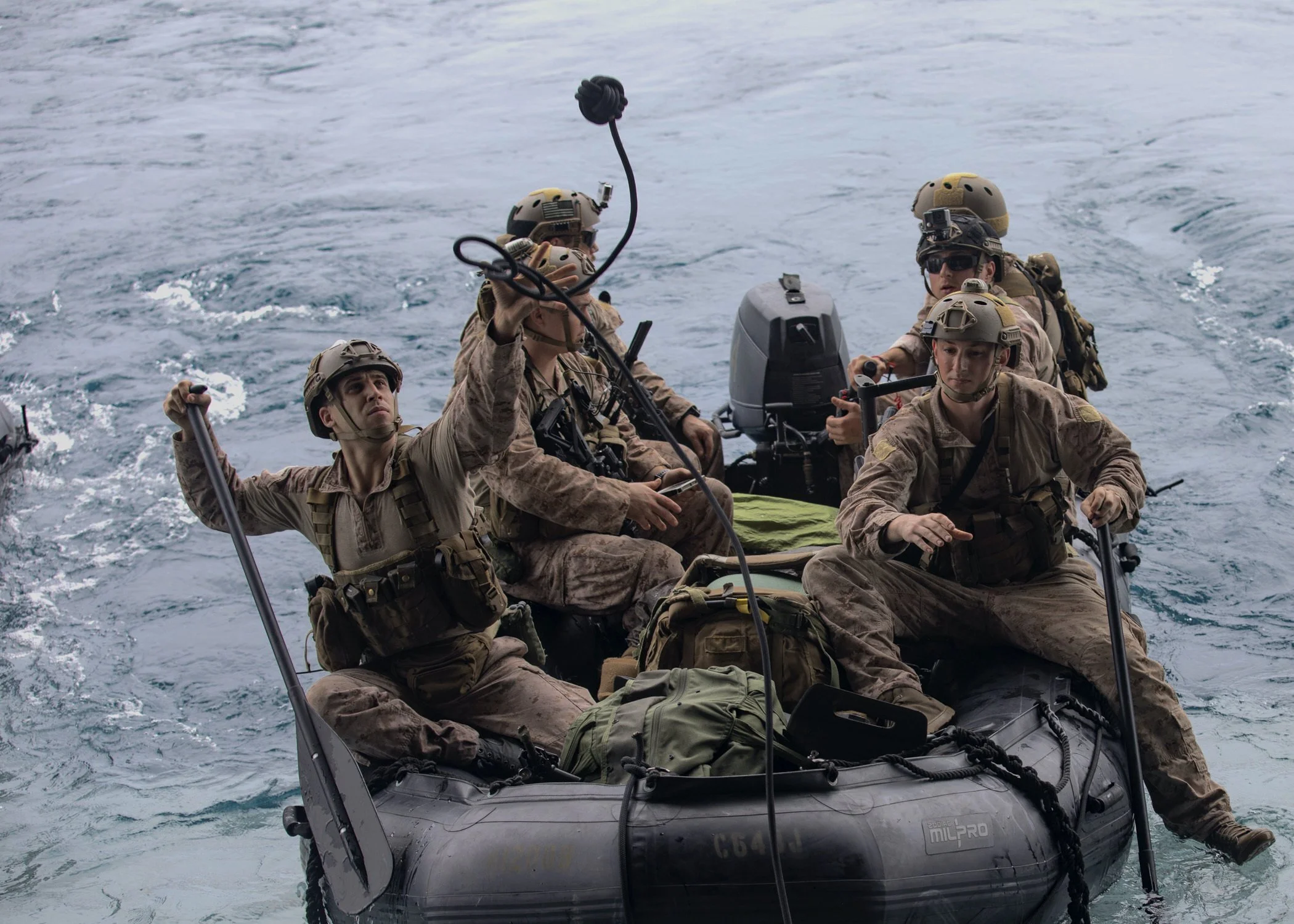 Marines, with the Maritime Raid Force, 26th Marine Expeditionary Unit (MEU), depart the well deck of the amphibious assault ship USS Bataan (LHD-5) during sustainment training, April 21, 2020. US Navy Photo
