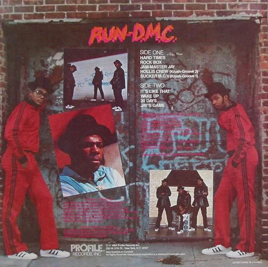 The CD backcover of RUN-D.M.C.’s debut album from 1984, showing off their Adidas tracksuits and Adidas Superstars