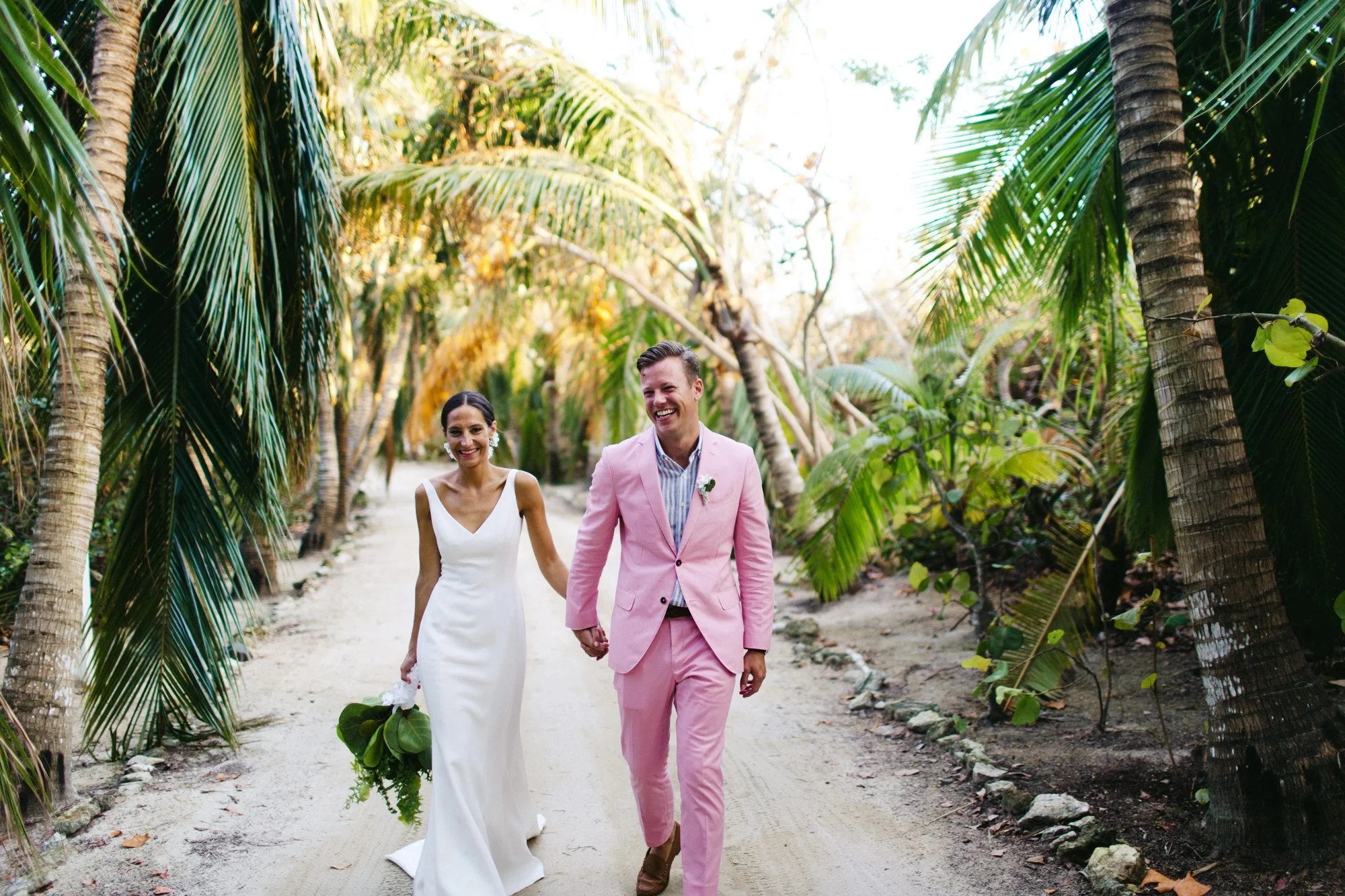 65-holding-isabel-seely-and-gregory-buntain-bahamas-wedding.jpeg