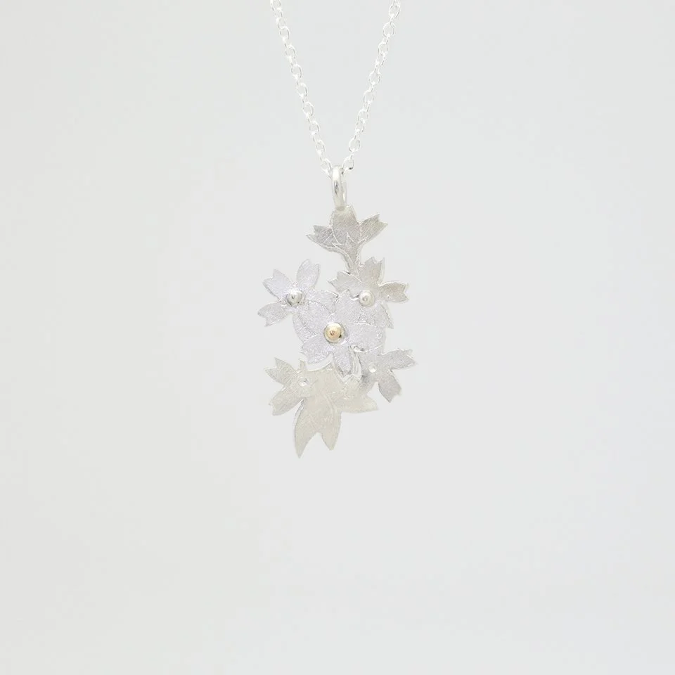 Cutout Blossom Pendant