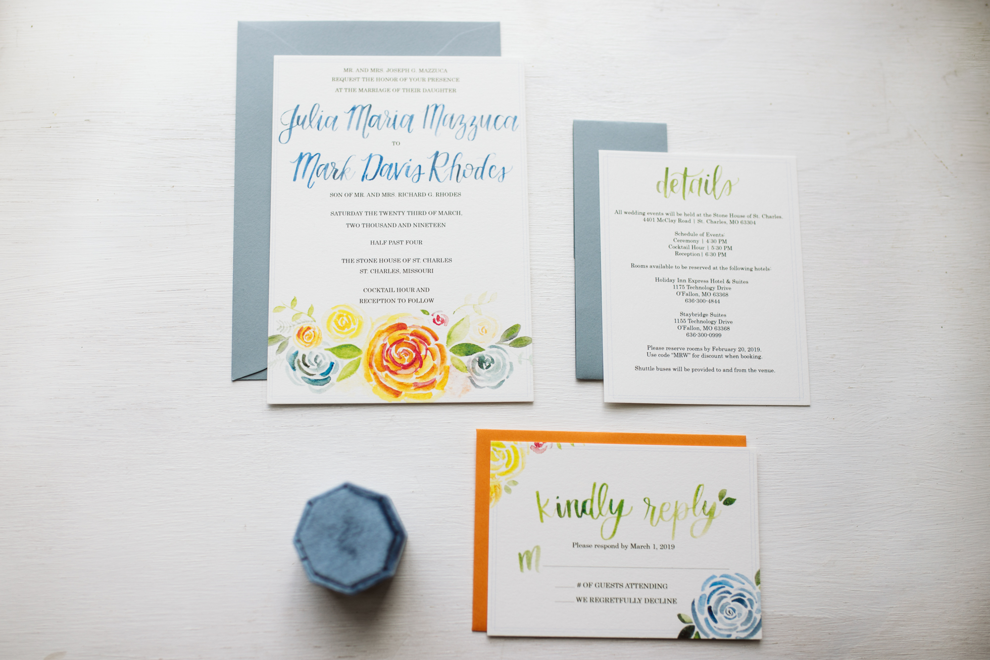 wedding invitation suite laid out in a window at Stone House of St Charles