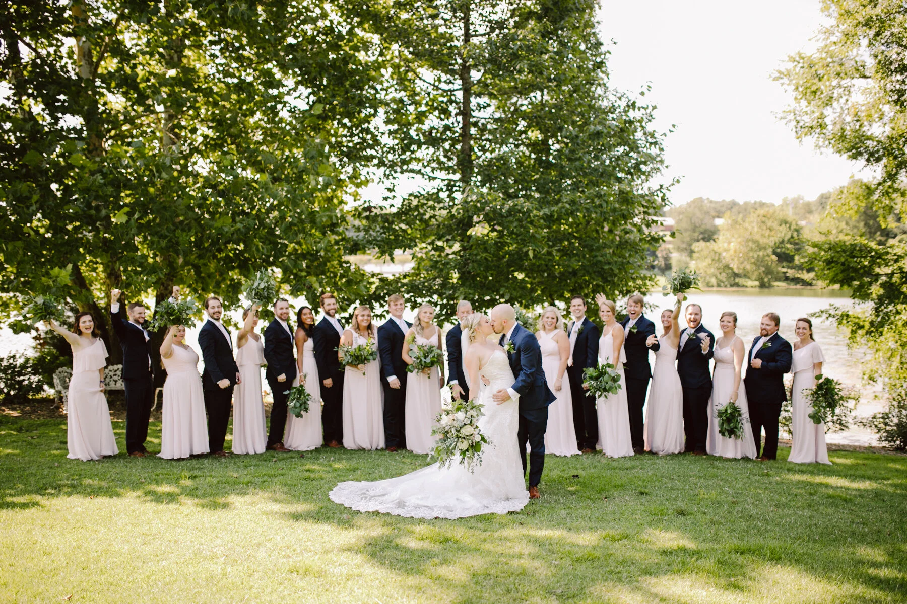 bridal party photos at a sunny outdoor wedding at hunter valley farms in knoxville tennessee