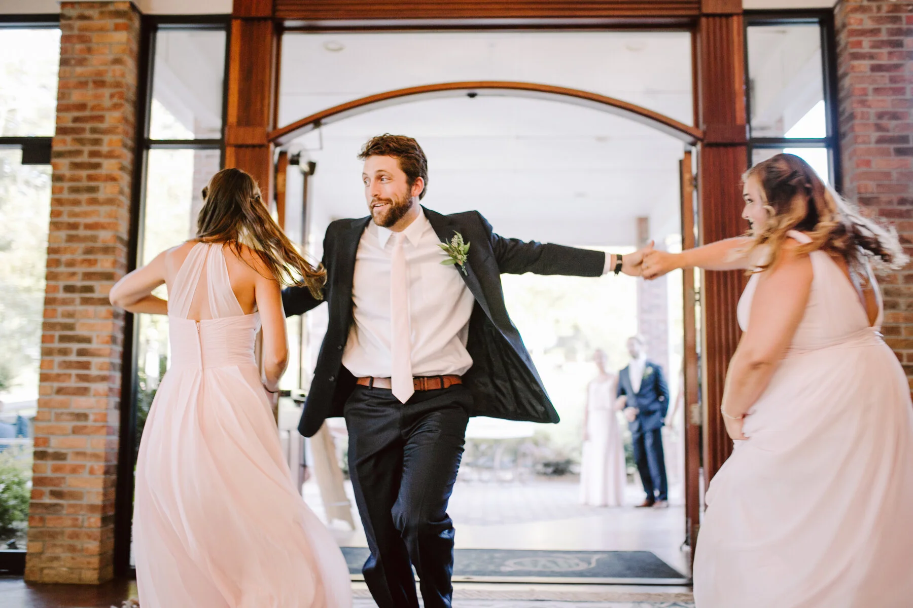 bridal party entrances after a sunny outdoor wedding at hunter valley farms in knoxville tennessee
