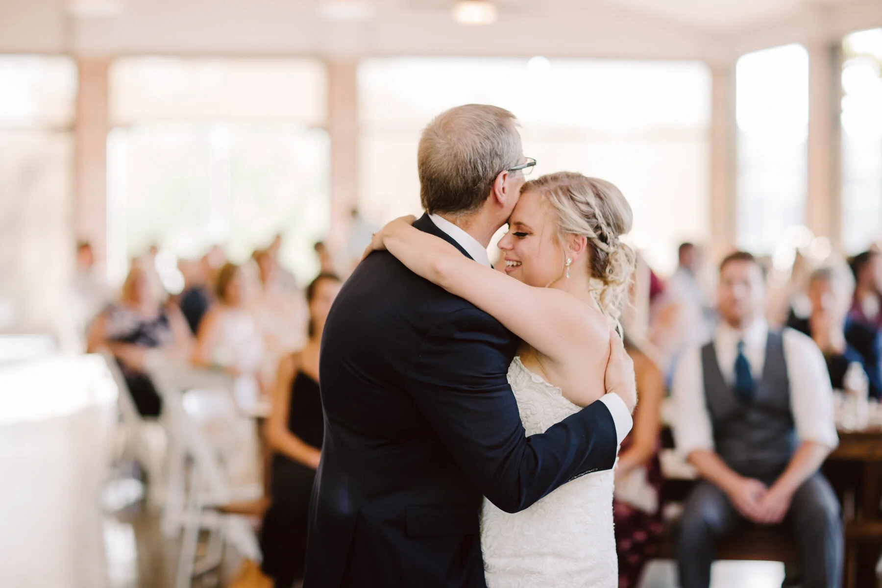 father daughter dance at a sunny outdoor wedding at hunter valley farms in knoxville tennessee