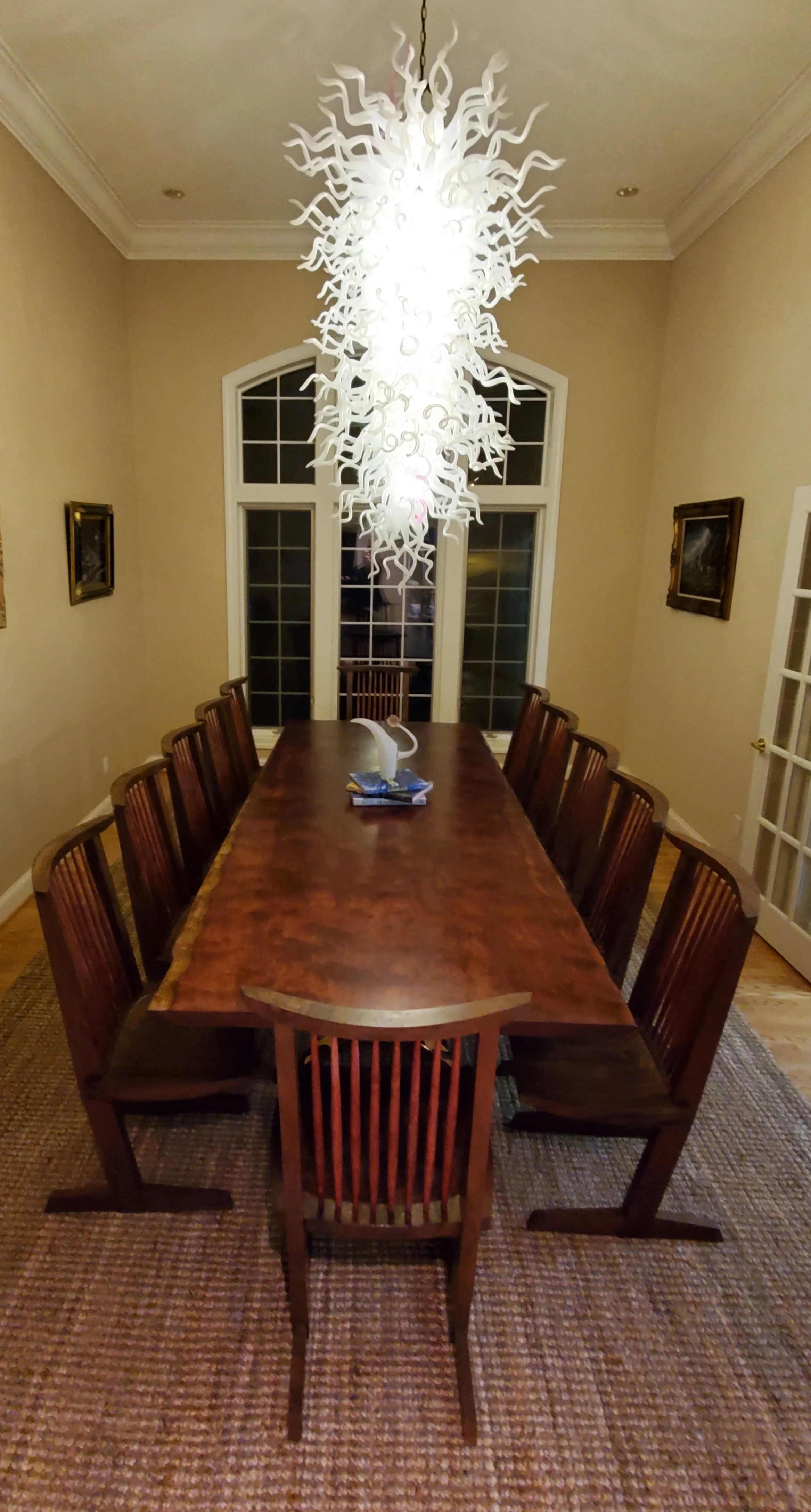 I made this bubinga and bronze table with the conoid chairs and chandelier for my own home