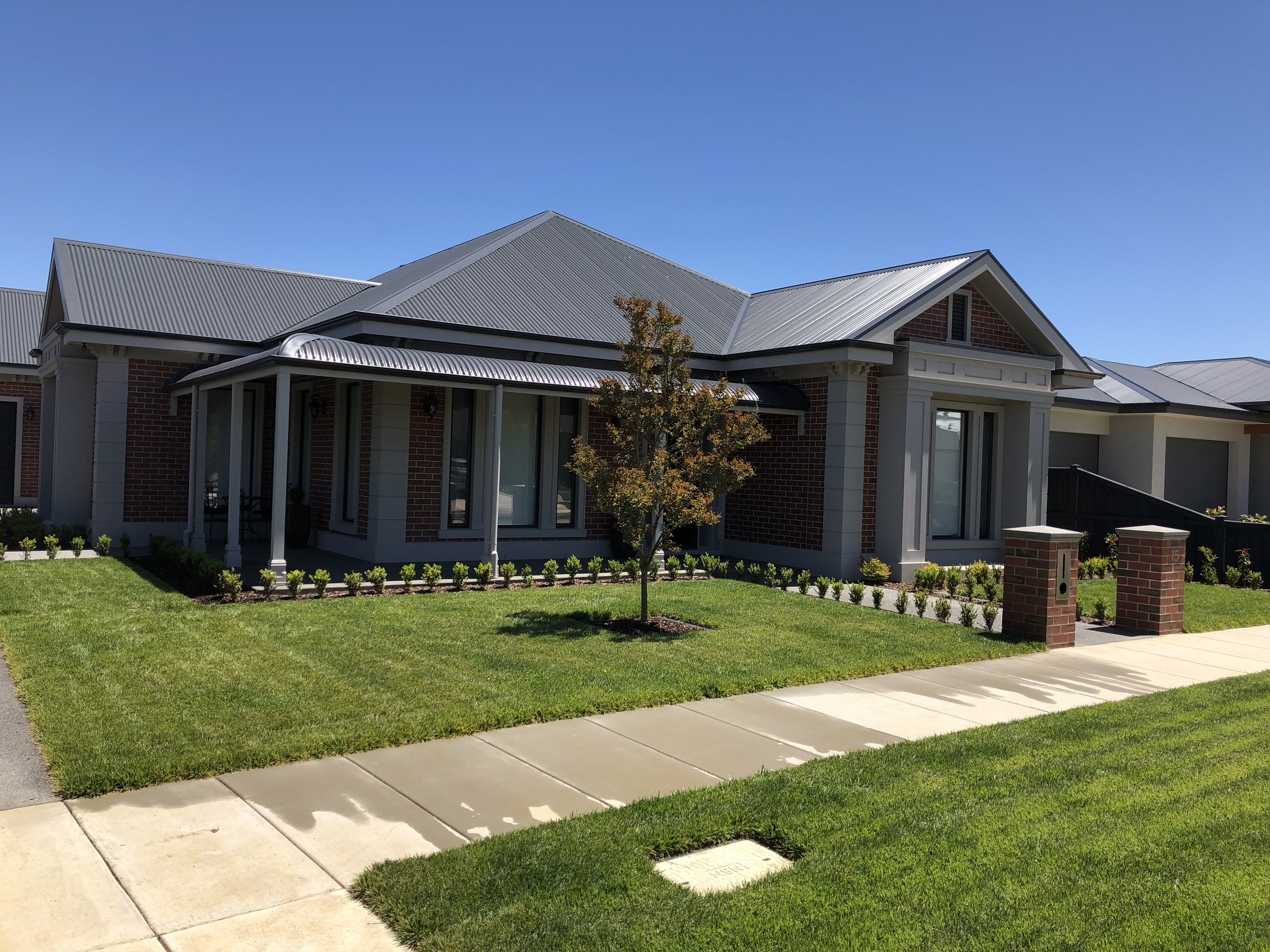 Instant turf front yard with hedging and semi-established feature tree