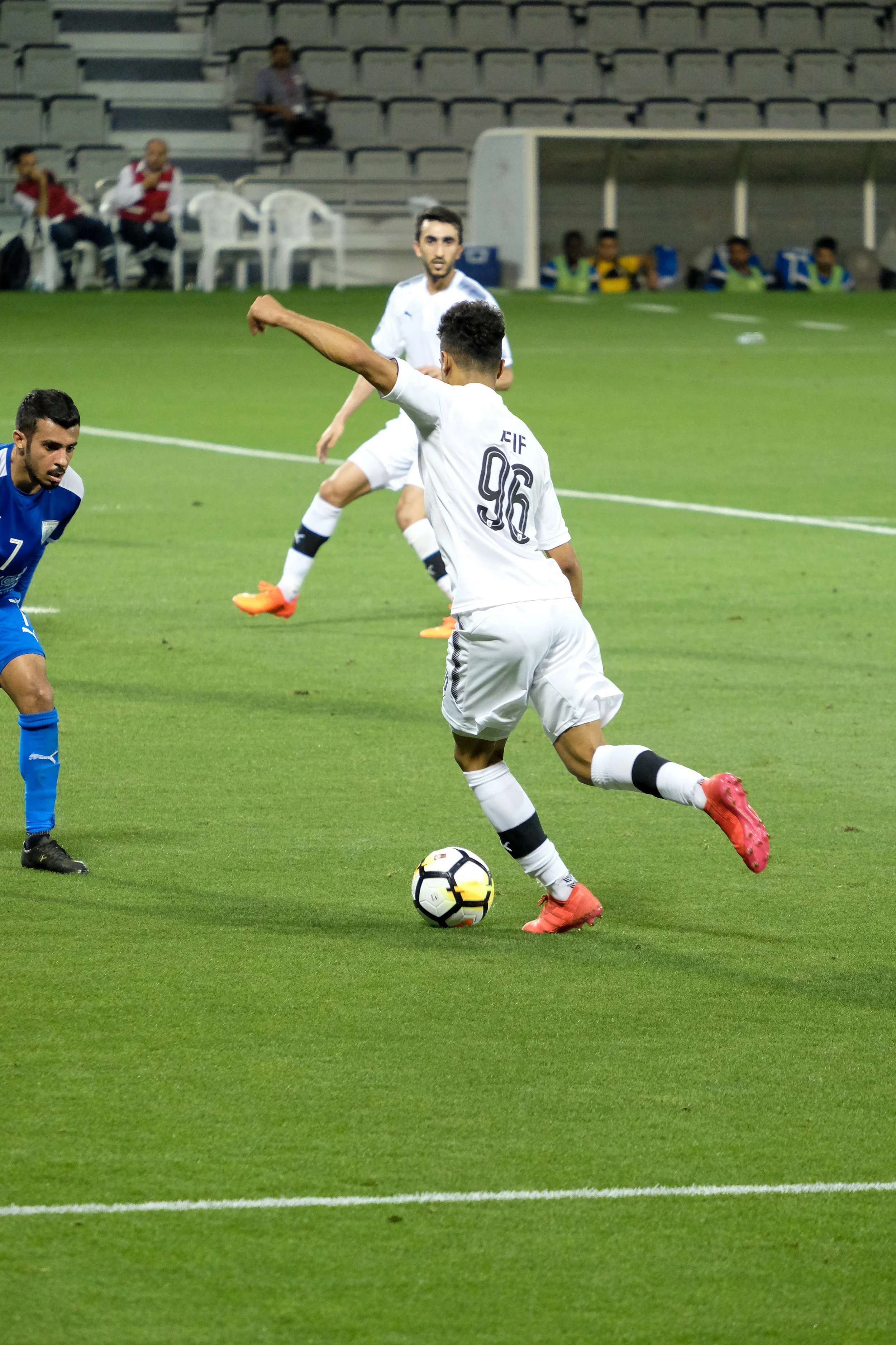 Afif dribbles into the box at the Jassim Bin Hamad Stadium.