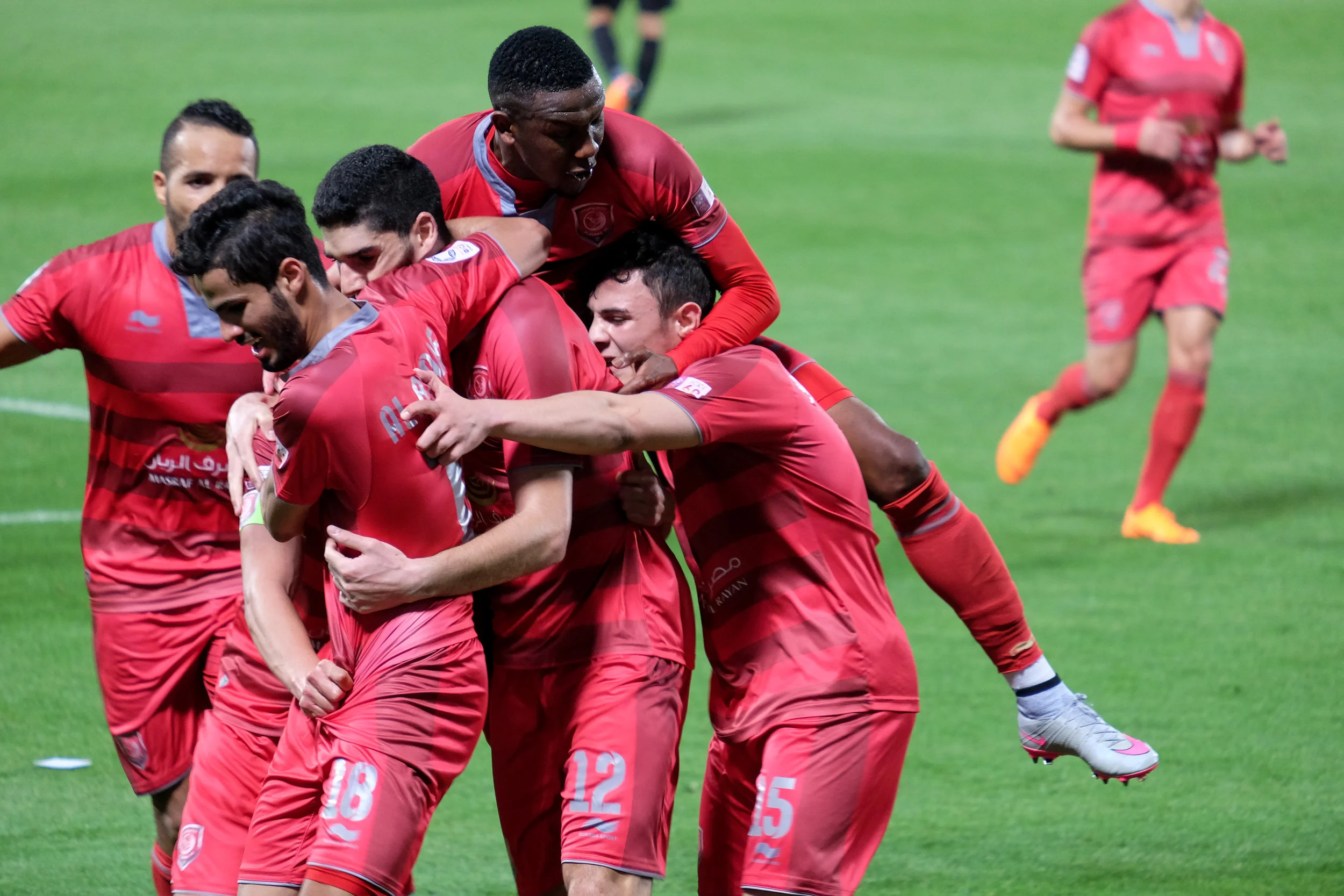 Eventual champions of the league, Al Duhail, celebrate a last gasp equaliser against nearest title challengers Al Sadd. The game finished 4-3 to Al Duhail.&nbsp;