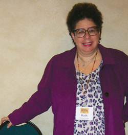 Ruth Thaler-Carter welcomes participants to recent conference.