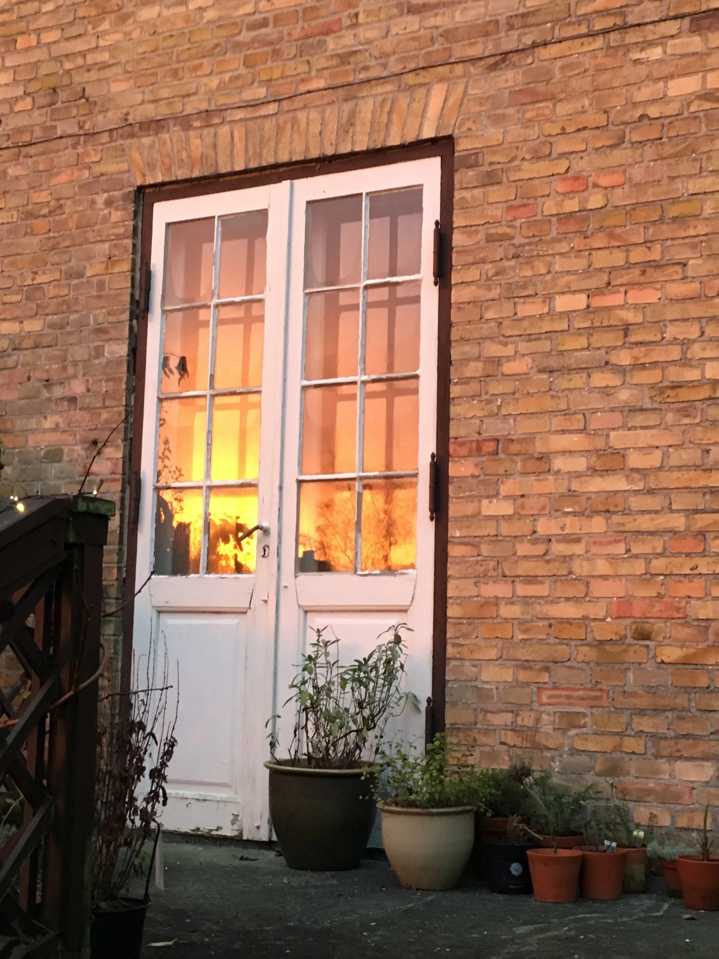 Solopgang i terrassedøren