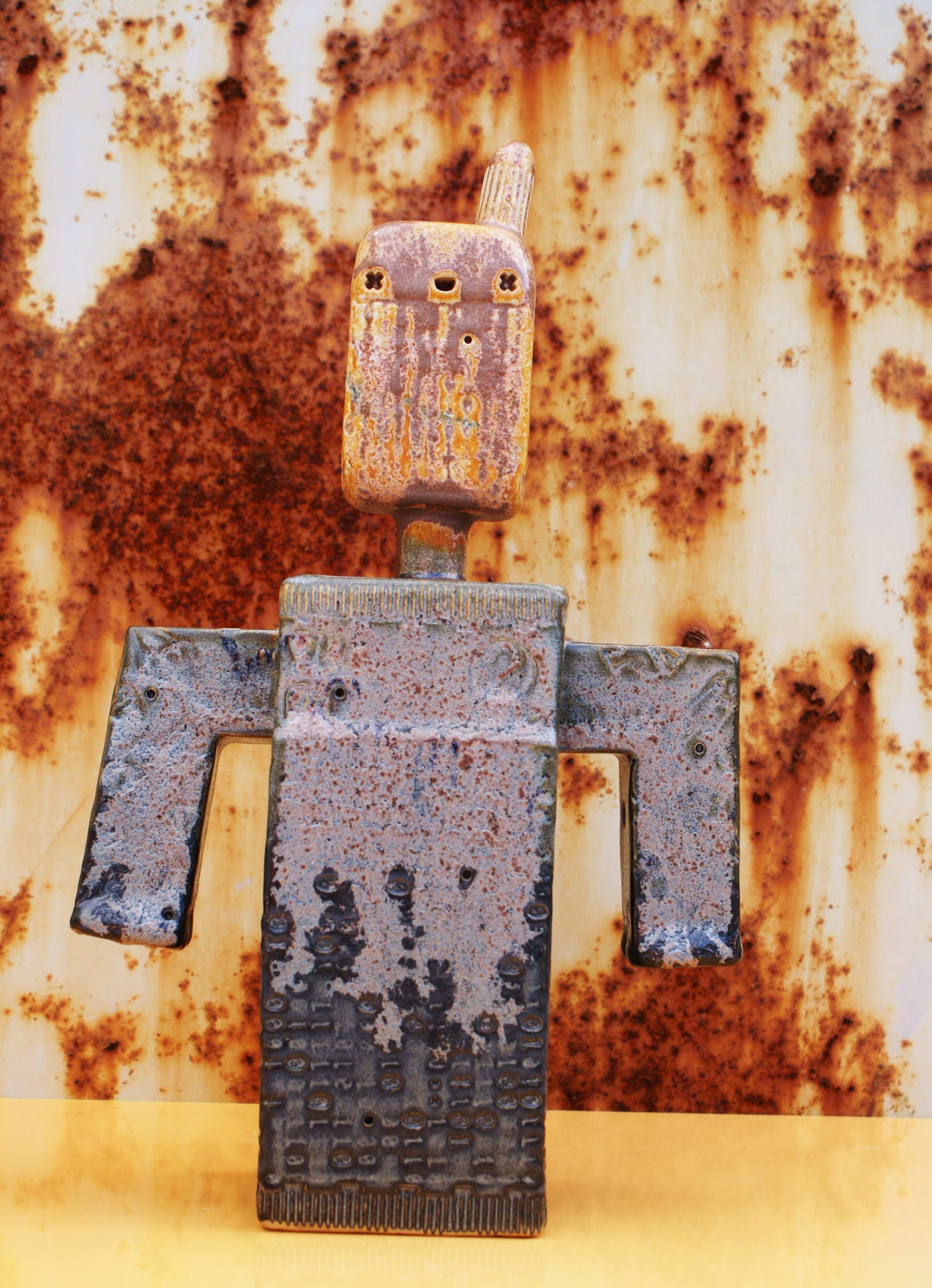 Claybot in orange and black