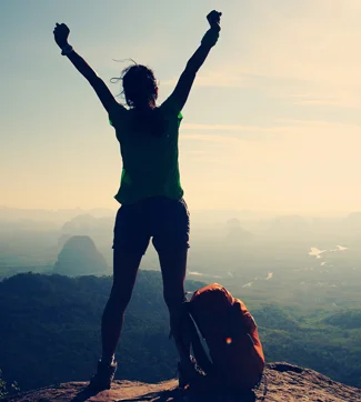 standing_two_feet_blog_woman_top_of_mtn.jpg