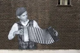 A mural of Guto on the wall of a (now, sadly, demolished) building in Cardiff
