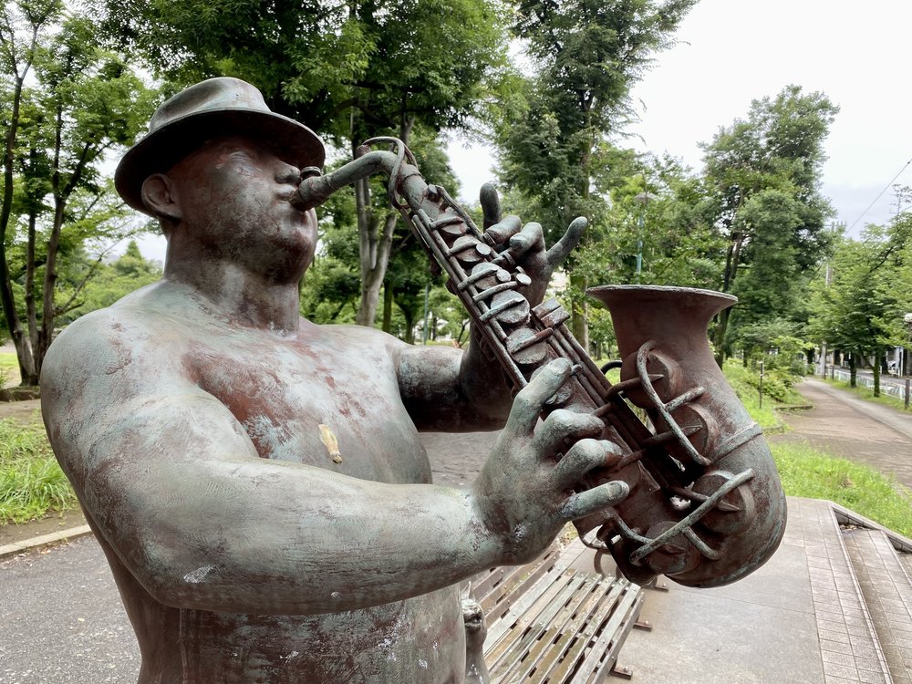 Saxophone statue face