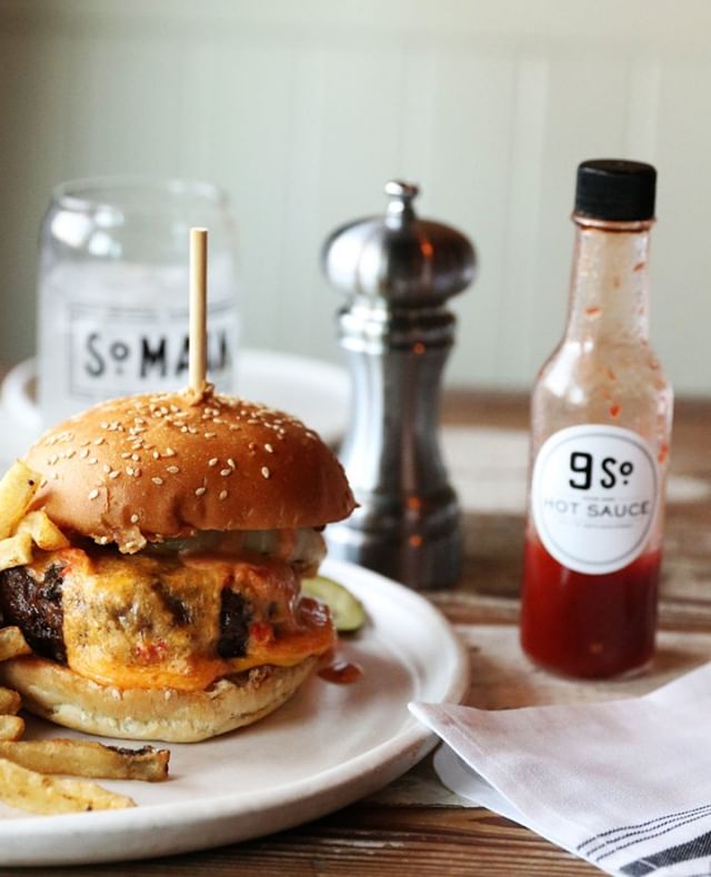 Rain or Shine a burger is always a good idea. | W. All Good Burger with our house hot sauce captured by @farmdus