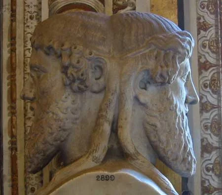 The two-headed Roman God Janus.