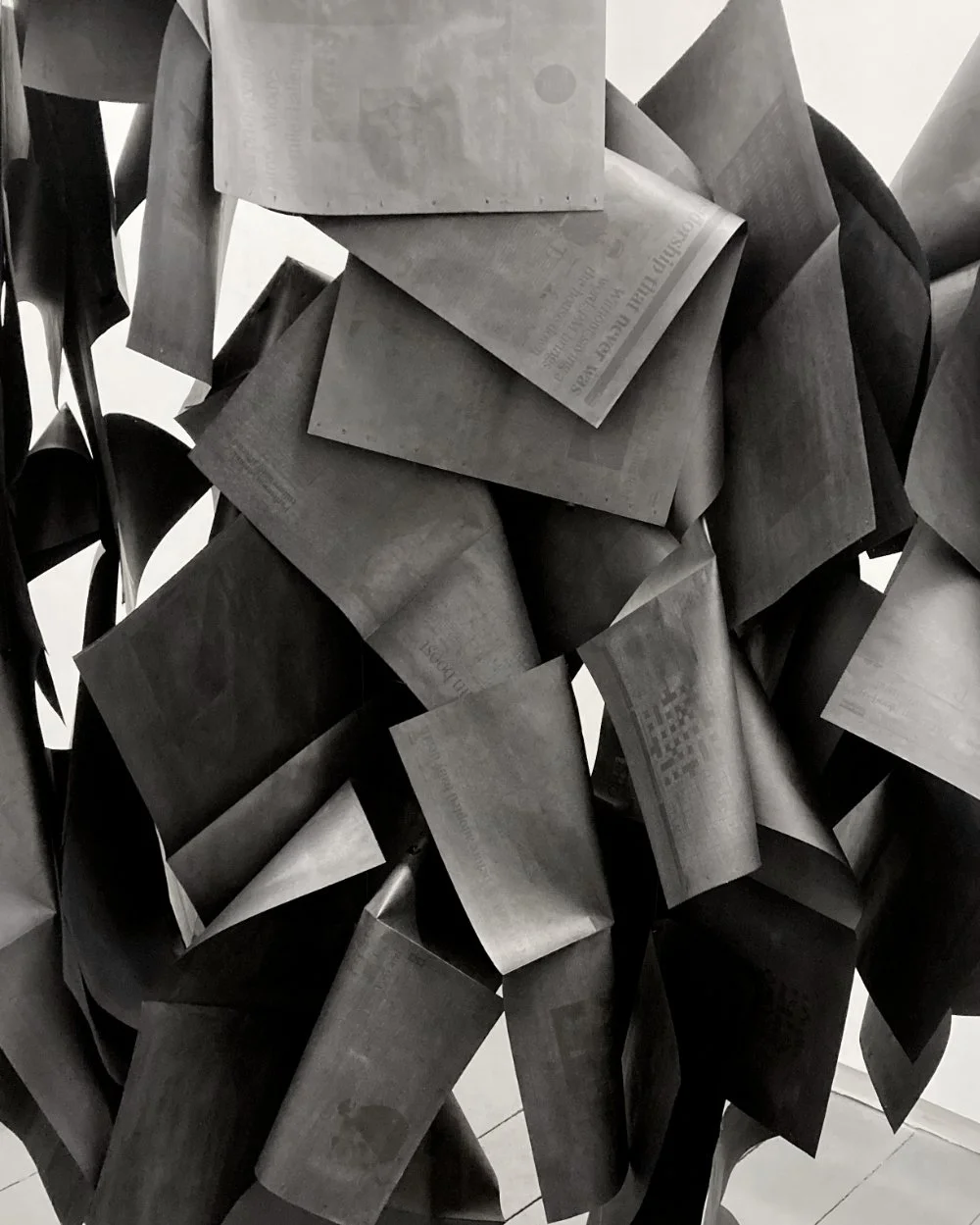 Media Storm : Kate McDonnell, 2026, installation detail [newspapers, ink]