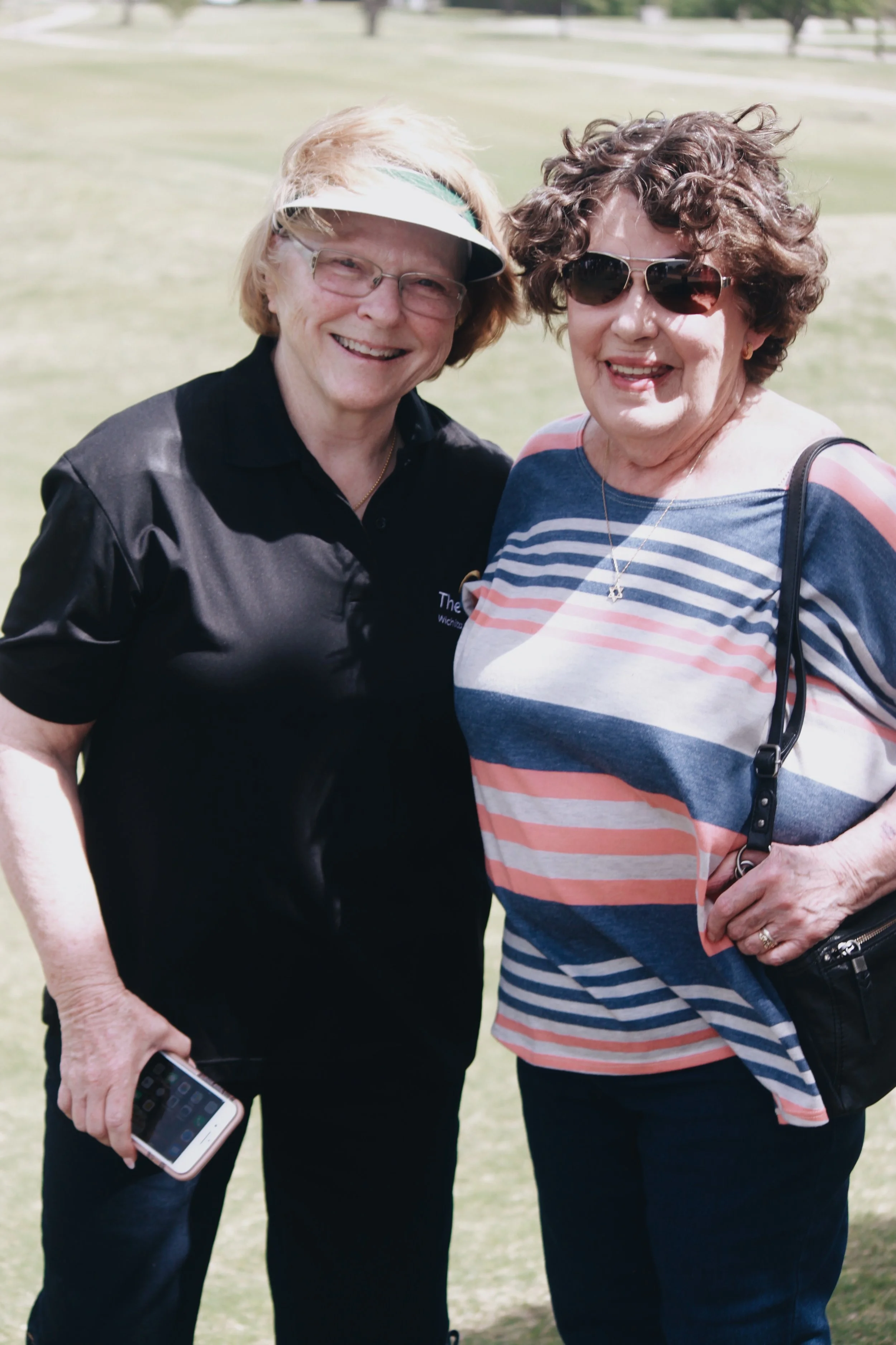(left to right) Parent, Penney Denman, and previous Executive Director, Marlene Goldstein
