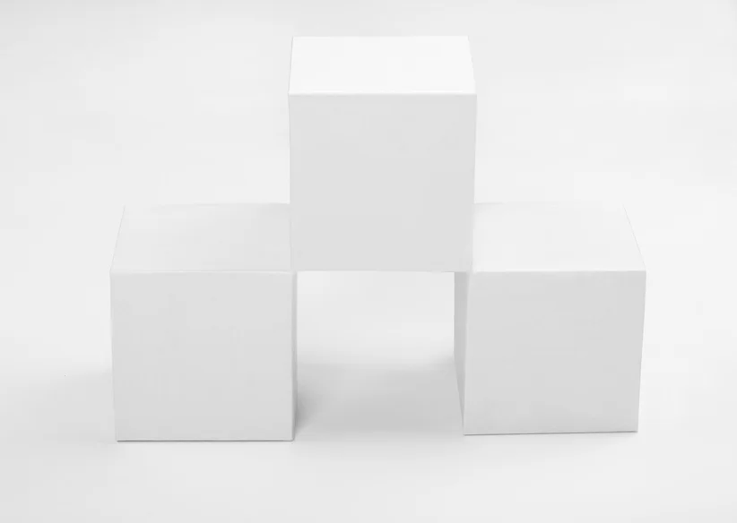 three white cubes