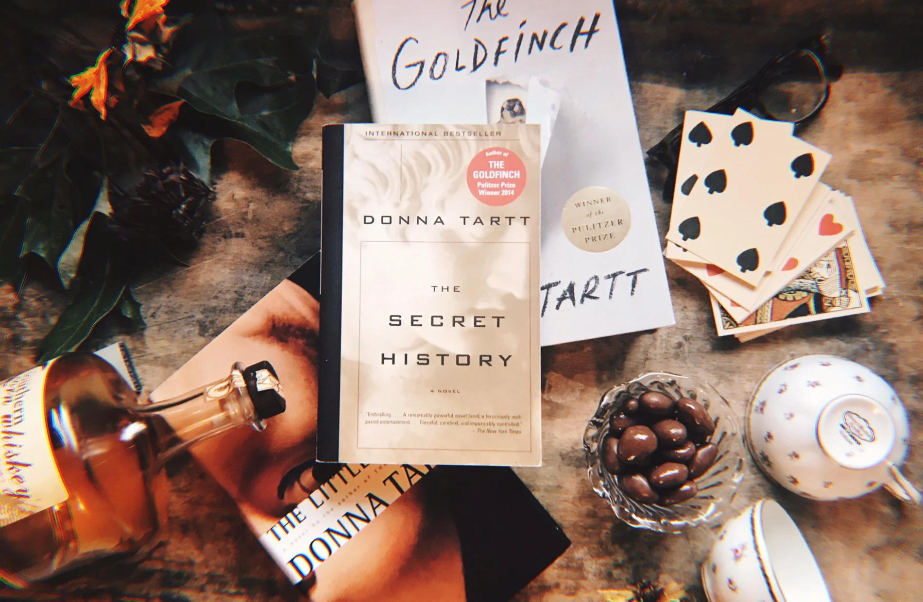 Tartt’s novels, and a selection of items mentioned throughout. Photo by Raquel Reyes.