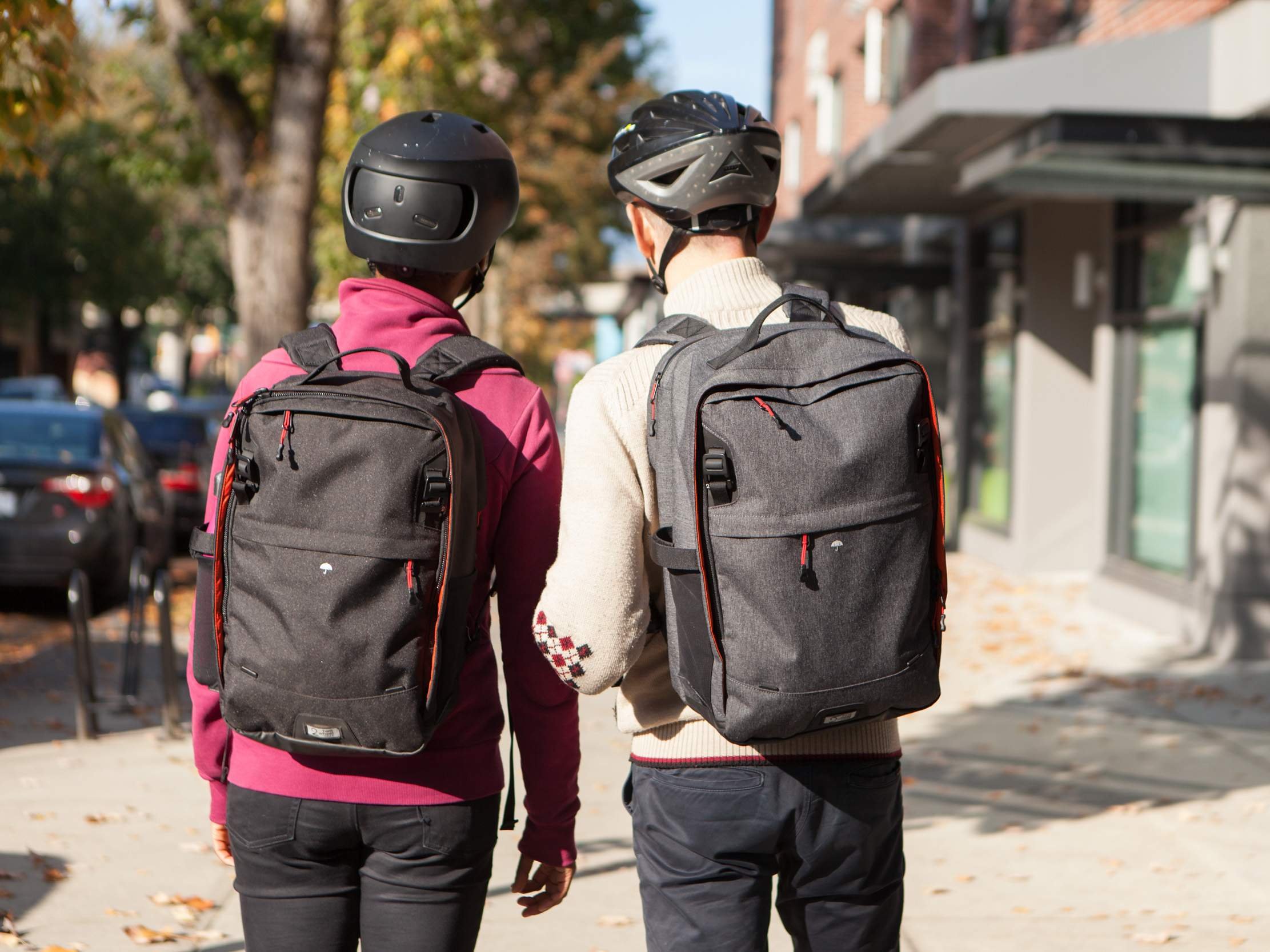 Two Wheel Gear - Pannier Backpack LITE and PLUS on Man and Woman.jpg