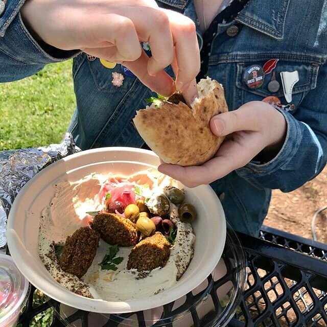 Nura picnic on a picture perfect day, with hummus, extra falafel and sabich. I had sabich when I was in Israel last year and it&rsquo;s such a thrill to taste it again, much closer to home. #springinmaine #alfrescolunch #picnicinthepark #portlandmain