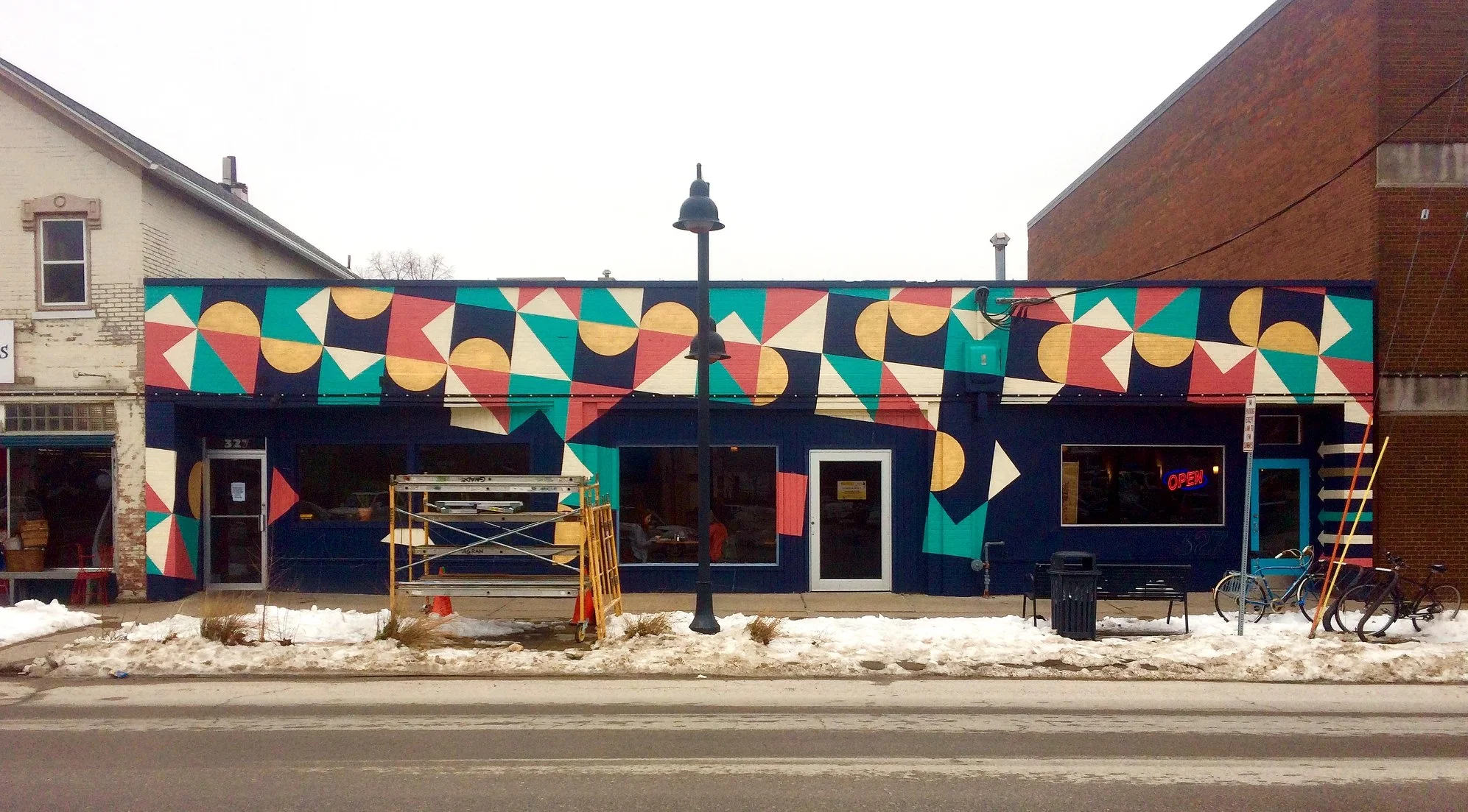 Restaurant façade wrap on Banditos Mexican restaurant in Iowa City. The restaurant formerly occupied only 1/2 of the building, and this project worked to unify the new facade and create a memorable, eye catching, and identifiable street presence.