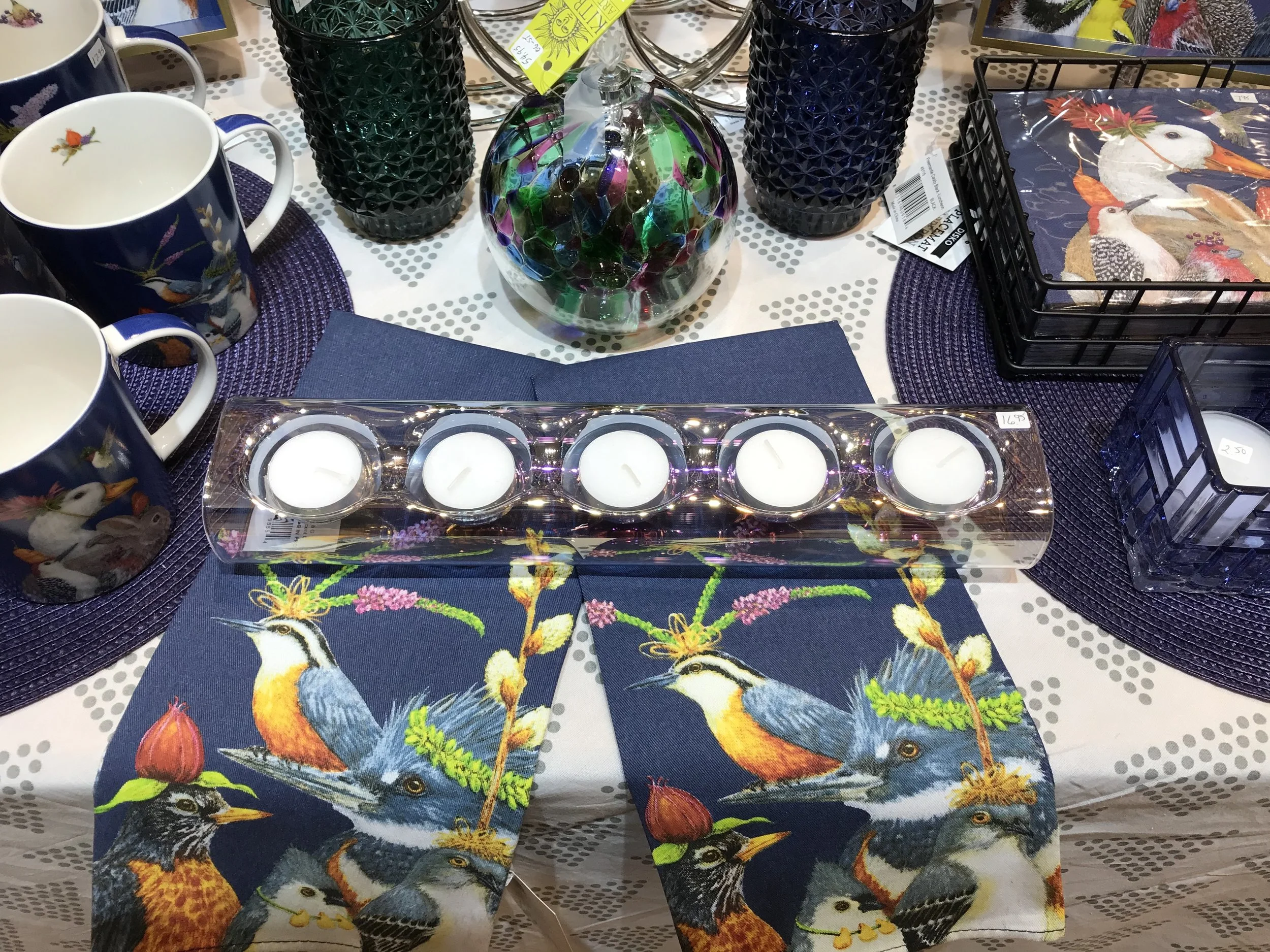 The new version of the popular “Cinquo” candle holder has and iridescent finish! Happy dance allowed!
