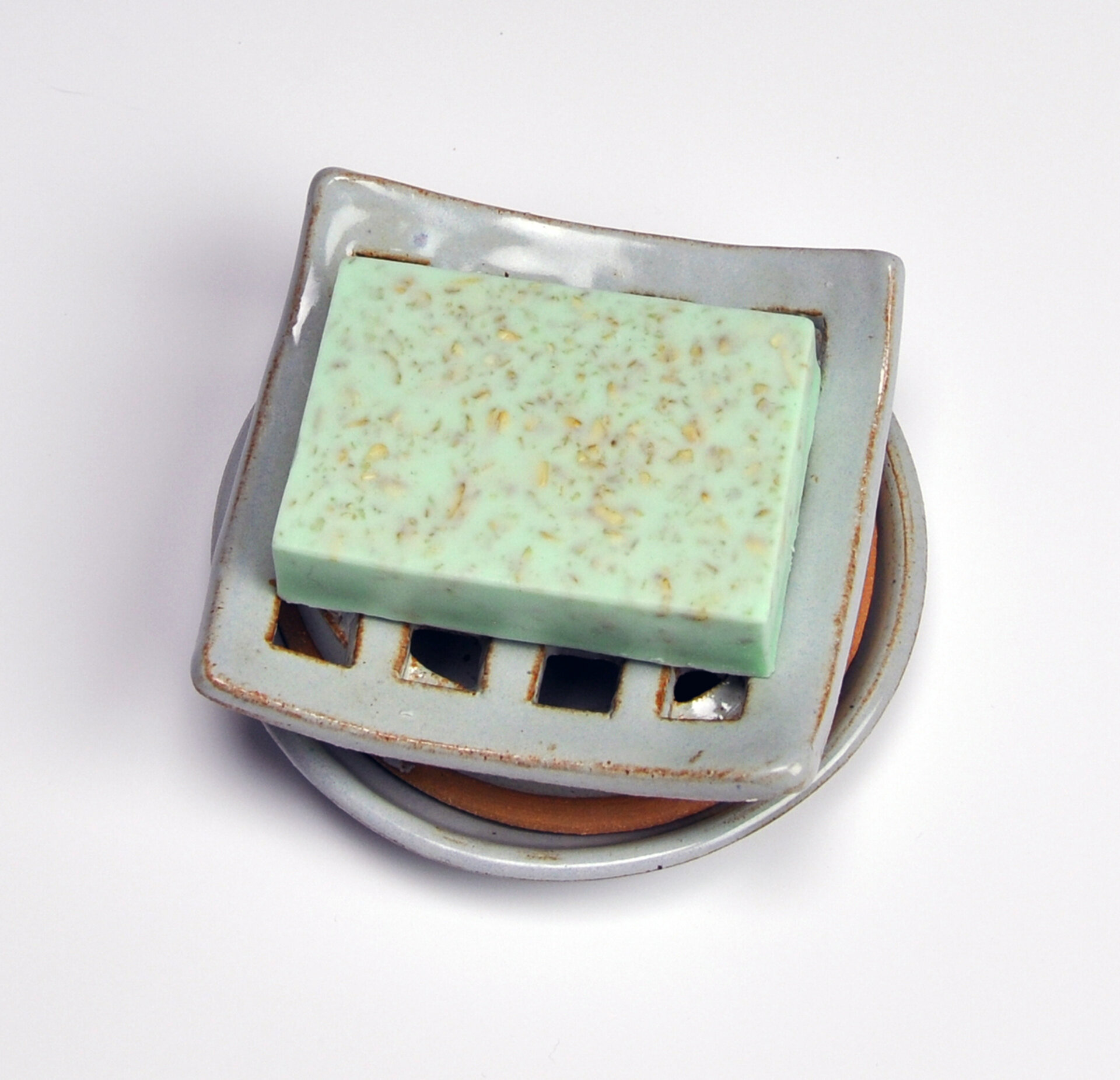 square grid blue soap dish with handmade oatmeal soap