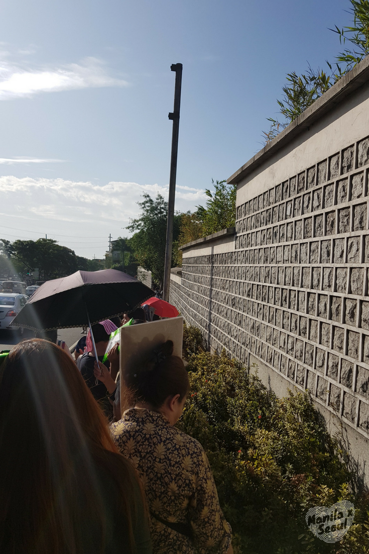 Queue outside the Embassy in Taguig.