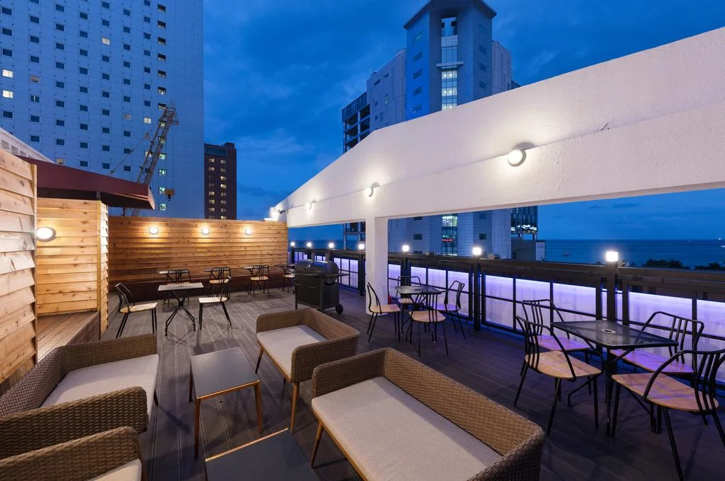 Chill in the rooftop. Image credit: Booking.com